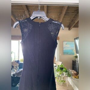 Size 0.  French Connection body con dress with lace.